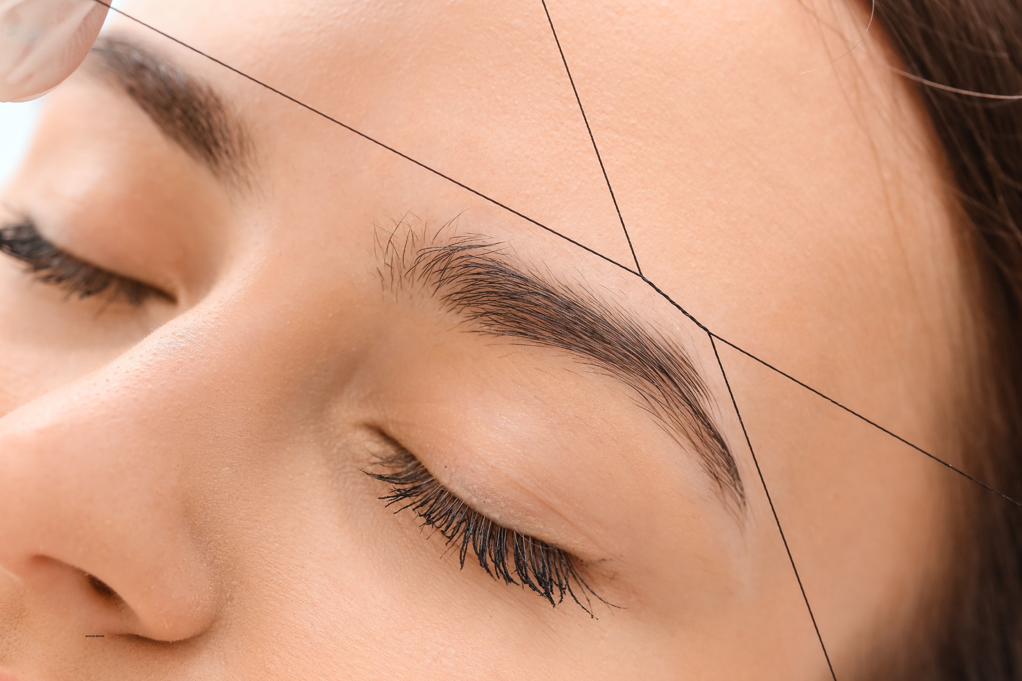 Close-up of shaped and polished eyebrows